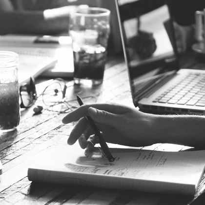 Taking notes during a meeting`